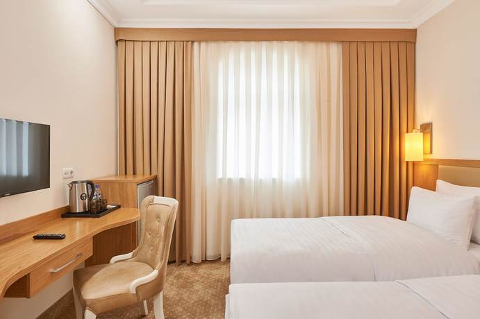 Imagen de la habitación del Hotel Praga, Taskent. Foto 14