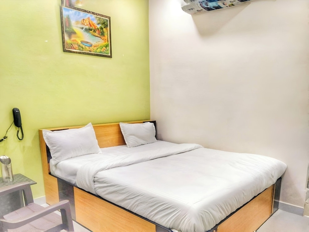 Imagen de la habitación del Hotel Pragati Heights. Foto 6
