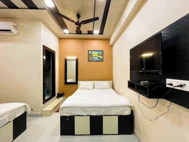 Imagen de la habitación del Hotel Pragati Heights. Foto 9