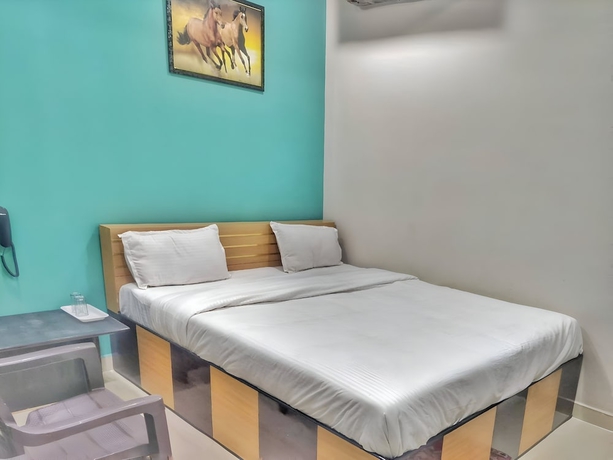 Imagen de la habitación del Hotel Pragati Heights. Foto 10