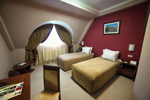 Imagen de la habitación del Hotel Praha, &Uacute;zhgorod. Foto 7