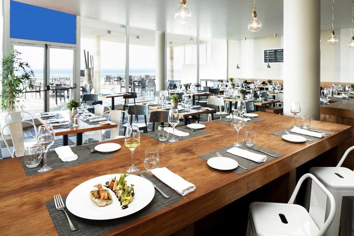 Imagen del bar/restaurante del Hotel Praia Del Rey Golf and Beach Resort - The Beachfront. Foto 2