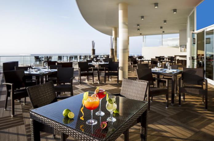 Imagen del bar/restaurante del Hotel Praia Del Rey Golf and Beach Resort - The Beachfront. Foto 4