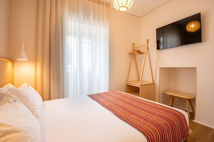 Imagen de la habitación del Hotel Praia FLHs Ericeira. Foto 17