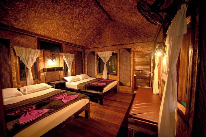 Imagen de la habitación del Hotel PraiwanRaftHouse. Foto 2