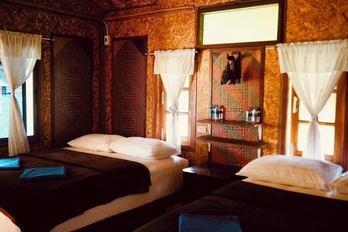 Imagen de la habitación del Hotel PraiwanRaftHouse. Foto 3