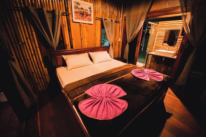 Imagen de la habitación del Hotel PraiwanRaftHouse. Foto 4