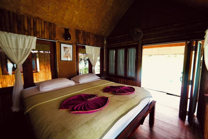 Imagen de la habitación del Hotel PraiwanRaftHouse. Foto 5