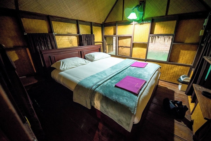Imagen de la habitación del Hotel PraiwanRaftHouse. Foto 6