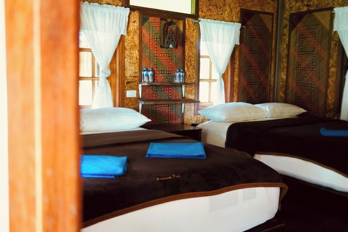 Imagen de la habitación del Hotel PraiwanRaftHouse. Foto 11