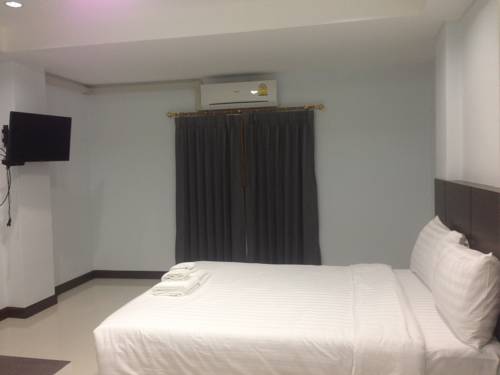 Imagen de la habitación del Hotel Praiyanan Place. Foto 7