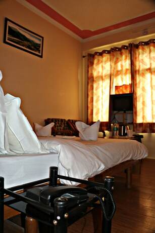 Imagen de la habitación del Hotel Prakash Regency Sangla. Foto 15