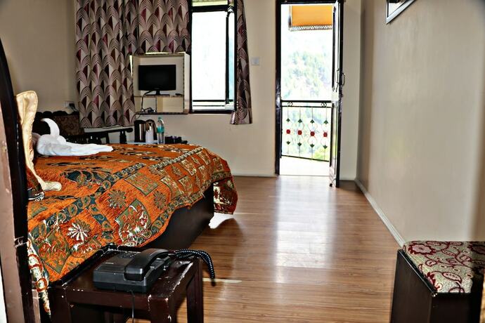 Imagen de la habitación del Hotel Prakash Regency Sangla. Foto 17