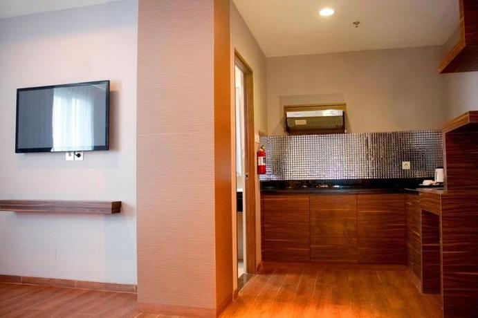 Imagen de la habitación del Hotel Pranaya Suites BSD City. Foto 12