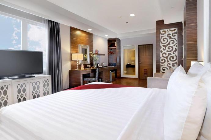 Imagen de la habitación del Hotel Pranaya Suites BSD City. Foto 15