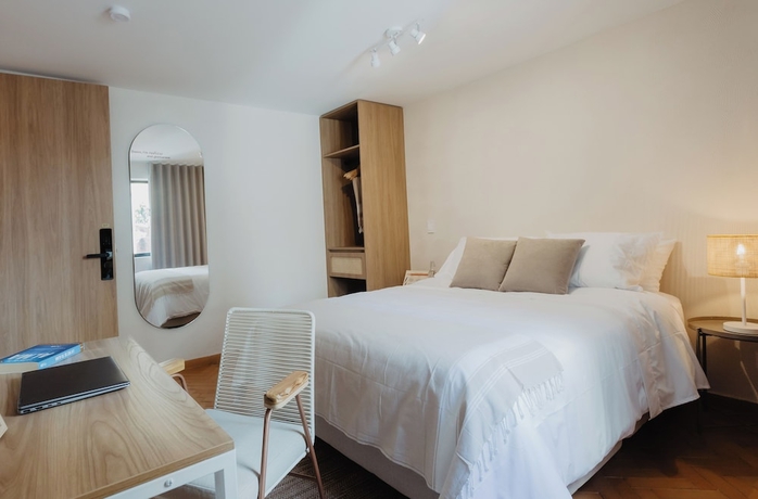 Imagen de la habitación del Hotel Pranik Living Co-mmunity. Foto 8