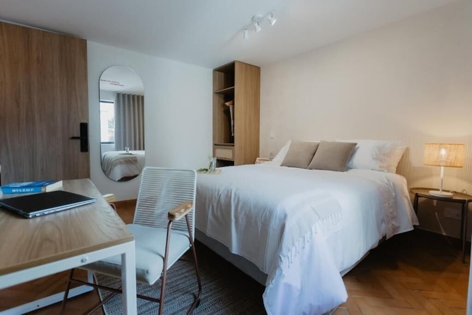 Imagen de la habitación del Hotel Pranik Living Co-mmunity. Foto 13