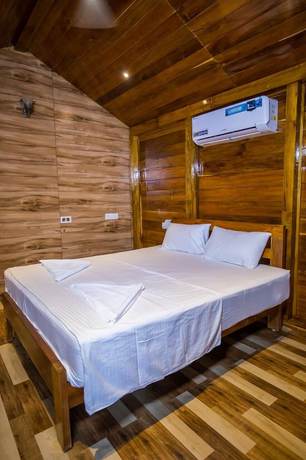 Imagen de la habitación del Hotel Prarthana Beach Stay. Foto 17