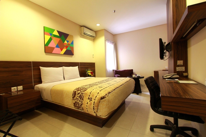 Imagen de la habitación del Hotel Prasada Mansion Sudirman. Foto 11