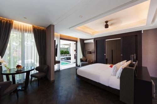 Imagen de la habitación del Hotel Prasana Villas Uluwatu. Foto 8