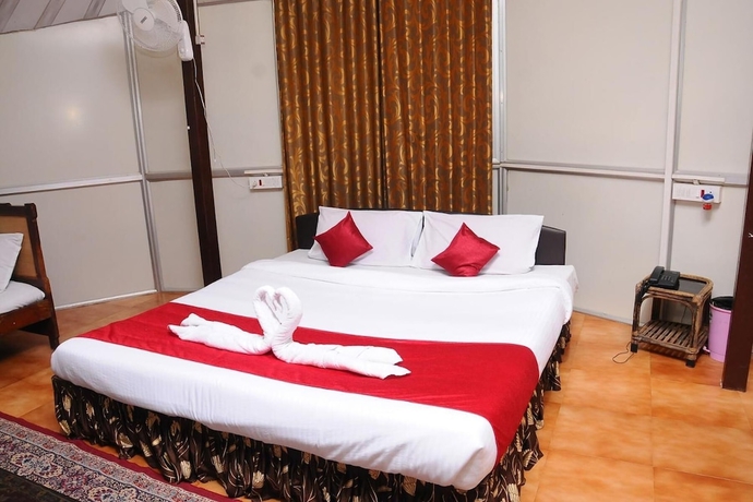 Imagen de la habitación del Hotel Prashanti Resort. Foto 15