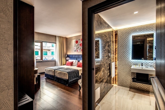 Imagen de la habitación del Hotel Prassede Palace. Foto 14