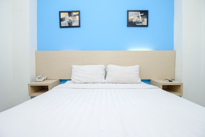 Imagen de la habitación del Hotel Pratama and Convention. Foto 10