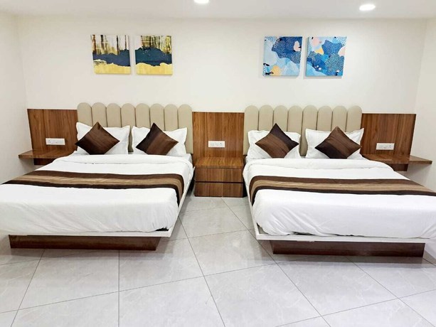 Imagen de la habitación del Hotel Pratham Inn. Foto 6