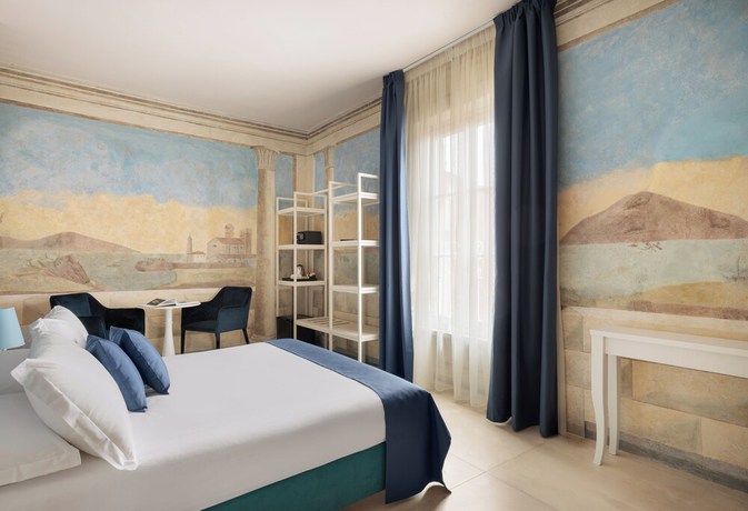 Imagen de la habitación del Hotel Prato dei Miracoli Residenza d'Epoca. Foto 6