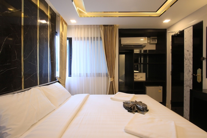 Imagen de la habitación del Hotel Pratunam Atrium. Foto 4