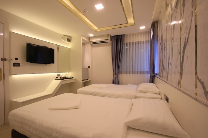 Imagen de la habitación del Hotel Pratunam Atrium. Foto 7