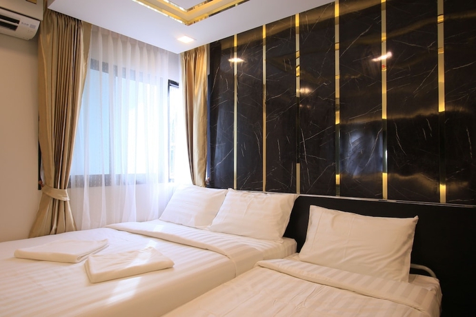 Imagen de la habitación del Hotel Pratunam Atrium. Foto 8