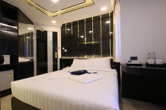 Imagen de la habitación del Hotel Pratunam Atrium. Foto 11