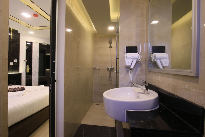 Imagen de la habitación del Hotel Pratunam Atrium. Foto 17
