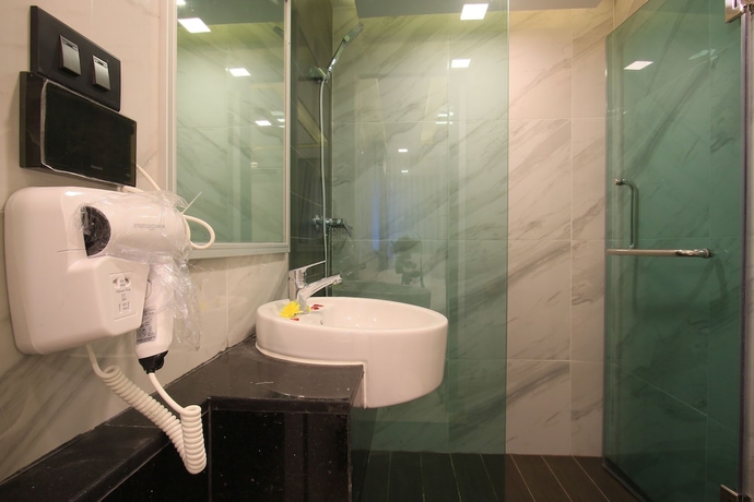Imagen de la habitación del Hotel Pratunam Atrium. Foto 18