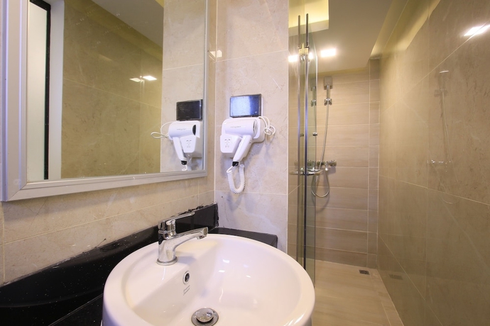 Imagen de la habitación del Hotel Pratunam Atrium. Foto 19