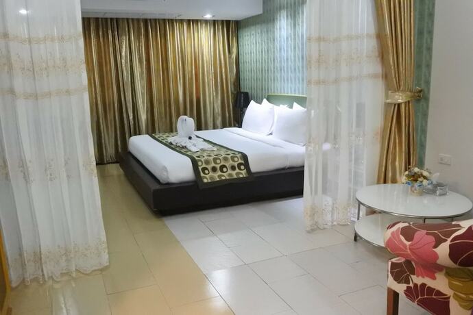 Imagen de la habitación del Hotel Pratunam Casa. Foto 16