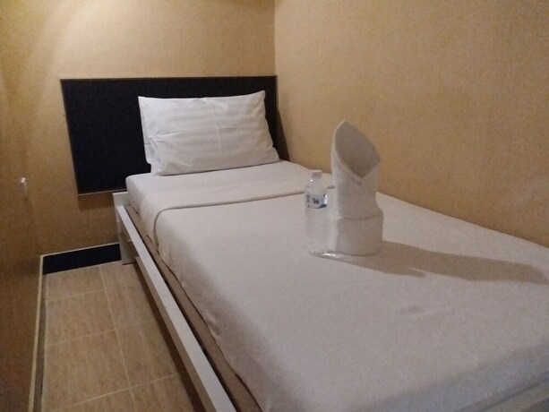 Imagen de la habitación del Hotel Pratunam Family House. Foto 8