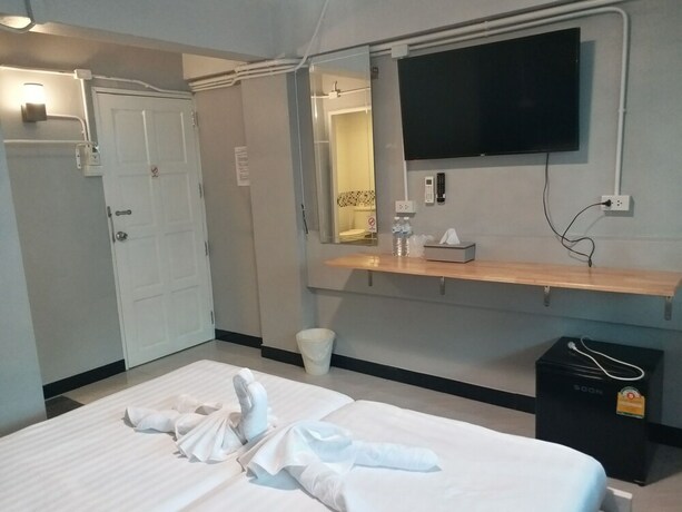 Imagen de la habitación del Hotel Pratunam Family House. Foto 11