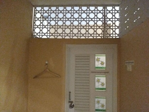 Imagen de la habitación del Hotel Pratunam Family House. Foto 18