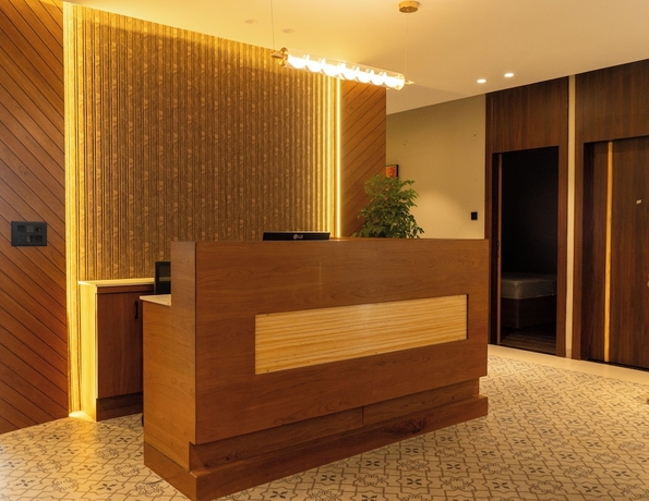 Imagen de los interiores del Hotel Pravasa Stay Near Luv Kush Square. Foto 10