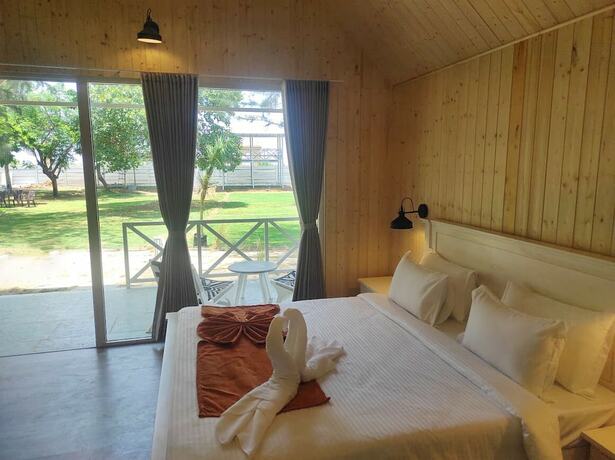 Imagen de la habitación del Hotel Praveg Beach Resort Lighthouse Daman. Foto 7