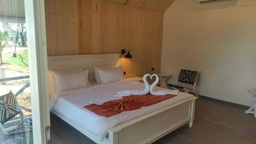 Imagen de la habitación del Hotel Praveg Beach Resort Lighthouse Daman. Foto 8