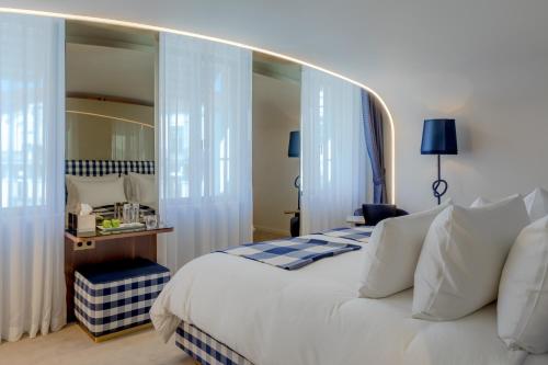 Imagen de la habitación del Hotel Praxis CBR Boutique Hotel - Coimbram. Foto 6