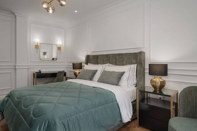 Imagen de la habitación del Hotel Praxitelous Luxury Suites. Foto 12