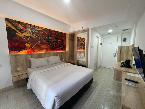 Imagen de la habitación del Hotel Praya Room. Foto 9