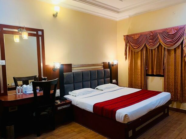 Imagen de la habitación del Hotel Prayag Inn. Foto 18