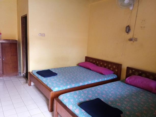 Imagen de la habitación del Hotel Prayogolama Guest House. Foto 9