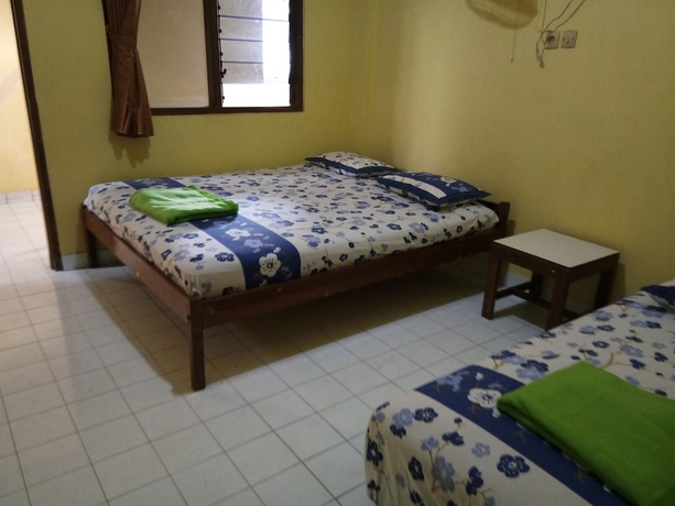 Imagen de la habitación del Hotel Prayogolama Guest House. Foto 11