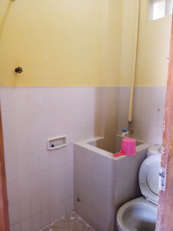 Imagen de la habitación del Hotel Prayogolama Guest House. Foto 12